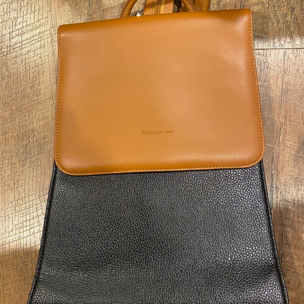 Tan and Black Backpack with Polished Finish